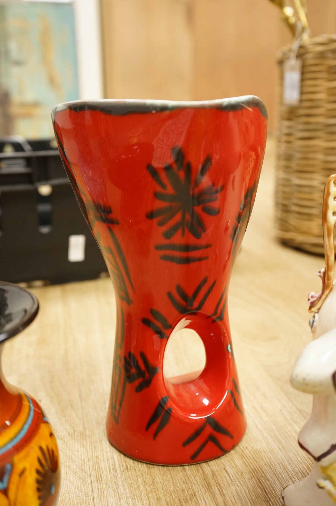 A collection of studio ceramics and pottery to include a Zsolnay vase and a Lyn Alves hexagonal dish
